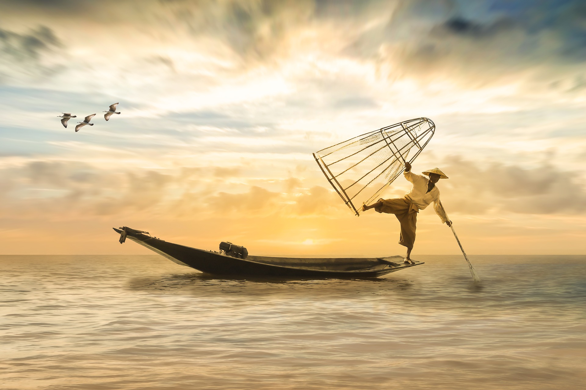 Chinesischer Fischer auf seinem Boot
